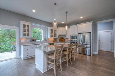 Welcome home to this stunning reverse 1.5-story patio villa on Shadow Glen Golf Club in Kansas - for sale on GolfHomes.com, golf home, golf lot