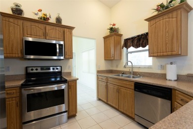 Here is what you have been looking for! A pool home in the on The Grand Club Cypress Course in Florida - for sale on GolfHomes.com, golf home, golf lot