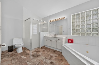 Welcome to your own private retreat in the highly desirable Boca on Bocaire Country Club in Florida - for sale on GolfHomes.com, golf home, golf lot
