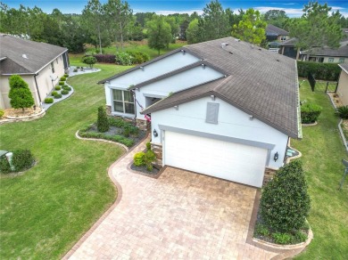 Experience the charm of this spacious and beautifully appointed on Stone Creek Golf Club in Florida - for sale on GolfHomes.com, golf home, golf lot