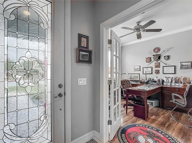 Experience the charm of this spacious and beautifully appointed on Stone Creek Golf Club in Florida - for sale on GolfHomes.com, golf home, golf lot
