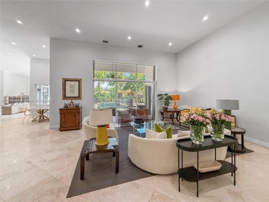 Welcome Home! This spectacular residence, boasting a lake and on Weston Hills Country Club in Florida - for sale on GolfHomes.com, golf home, golf lot