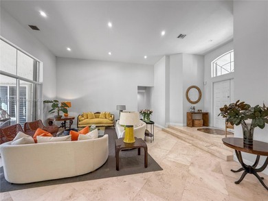 Welcome Home! This spectacular residence, boasting a lake and on Weston Hills Country Club in Florida - for sale on GolfHomes.com, golf home, golf lot