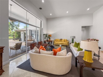 Welcome Home! This spectacular residence, boasting a lake and on Weston Hills Country Club in Florida - for sale on GolfHomes.com, golf home, golf lot