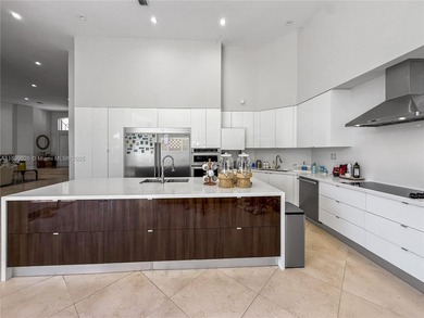 Welcome Home! This spectacular residence, boasting a lake and on Weston Hills Country Club in Florida - for sale on GolfHomes.com, golf home, golf lot