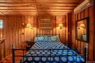 This comfortable cabin is located in a prime trout fishing area on  in Arkansas - for sale on GolfHomes.com, golf home, golf lot