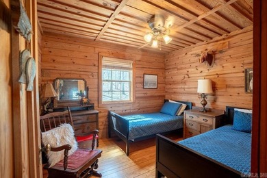 This comfortable cabin is located in a prime trout fishing area on  in Arkansas - for sale on GolfHomes.com, golf home, golf lot