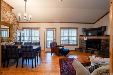 This comfortable cabin is located in a prime trout fishing area on  in Arkansas - for sale on GolfHomes.com, golf home, golf lot