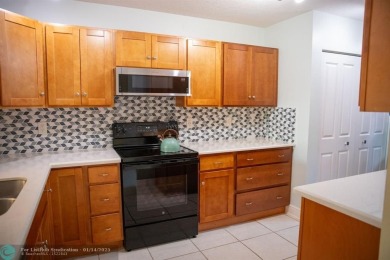 Recently updated, this first-floor condominium is situated in an on Delaire Golf and Country Club in Florida - for sale on GolfHomes.com, golf home, golf lot