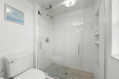 This beautifully renovated half duplex is situated at the on The Dunes Golf and Tennis Club in Florida - for sale on GolfHomes.com, golf home, golf lot