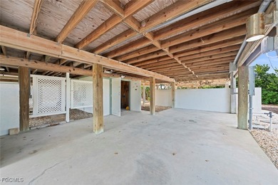 This beautifully renovated half duplex is situated at the on The Dunes Golf and Tennis Club in Florida - for sale on GolfHomes.com, golf home, golf lot