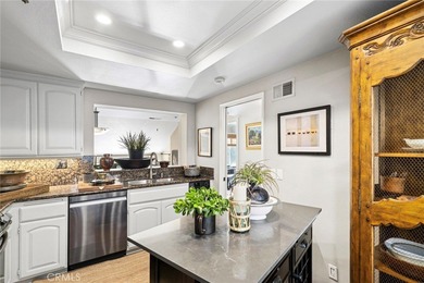 Discover effortless coastal living in this charming 2-bedroom on Big Canyon Country Club in California - for sale on GolfHomes.com, golf home, golf lot