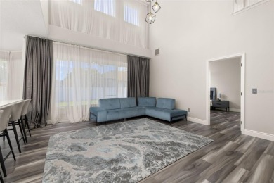 Welcome to this stunning, fully updated 5-bedroom, 3.5-bathroom on Eagle Creek Golf Club in Florida - for sale on GolfHomes.com, golf home, golf lot