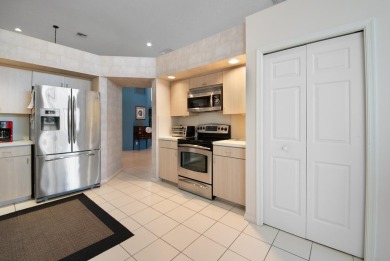 Welcome to this beautifully maintained 3-bedroom, 2.5-bath home on Indian Spring Golf and Country Club in Florida - for sale on GolfHomes.com, golf home, golf lot