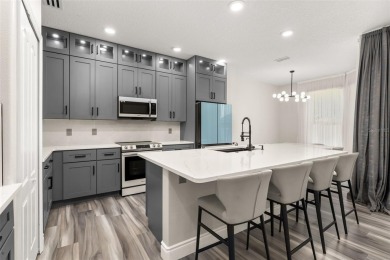 Welcome to this stunning, fully updated 5-bedroom, 3.5-bathroom on Eagle Creek Golf Club in Florida - for sale on GolfHomes.com, golf home, golf lot