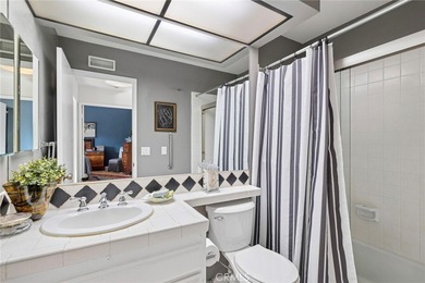 Discover effortless coastal living in this charming 2-bedroom on Big Canyon Country Club in California - for sale on GolfHomes.com, golf home, golf lot