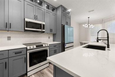 Welcome to this stunning, fully updated 5-bedroom, 3.5-bathroom on Eagle Creek Golf Club in Florida - for sale on GolfHomes.com, golf home, golf lot