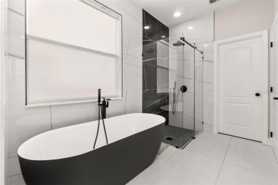 Welcome to this stunning, fully updated 5-bedroom, 3.5-bathroom on Eagle Creek Golf Club in Florida - for sale on GolfHomes.com, golf home, golf lot