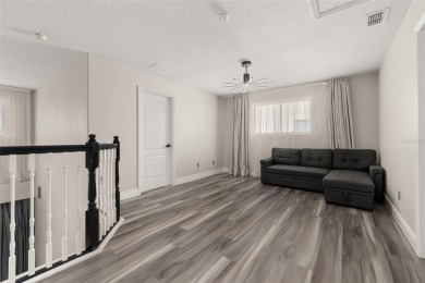 Welcome to this stunning, fully updated 5-bedroom, 3.5-bathroom on Eagle Creek Golf Club in Florida - for sale on GolfHomes.com, golf home, golf lot