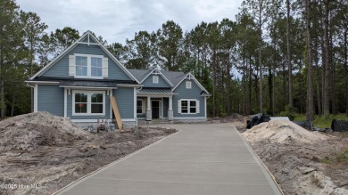 Discover the charm of the Anchor, a 3-bed, 3.5-bath home with a on Sea Trail Golf Resort in North Carolina - for sale on GolfHomes.com, golf home, golf lot
