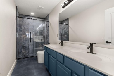 Welcome to this stunning, fully updated 5-bedroom, 3.5-bathroom on Eagle Creek Golf Club in Florida - for sale on GolfHomes.com, golf home, golf lot