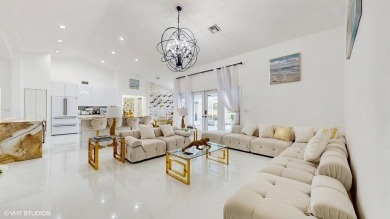 Marvelous paradise home located in the Heart of Wellington. Step on Greenview Cove Golf Club in Florida - for sale on GolfHomes.com, golf home, golf lot