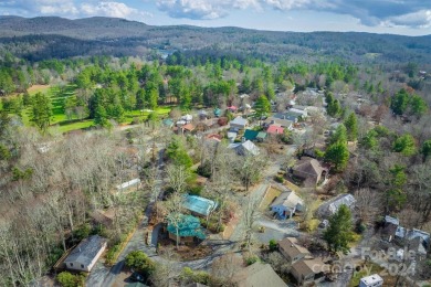 Nestled in the serene beauty of the North Carolina mountains on Land Harbor Golf Course in North Carolina - for sale on GolfHomes.com, golf home, golf lot