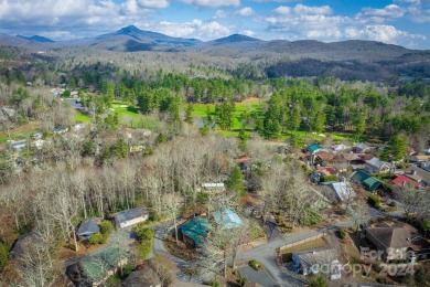 Nestled in the serene beauty of the North Carolina mountains on Land Harbor Golf Course in North Carolina - for sale on GolfHomes.com, golf home, golf lot