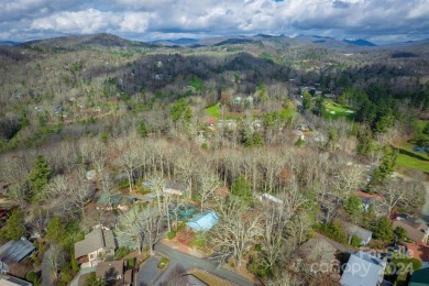 Nestled in the serene beauty of the North Carolina mountains on Land Harbor Golf Course in North Carolina - for sale on GolfHomes.com, golf home, golf lot