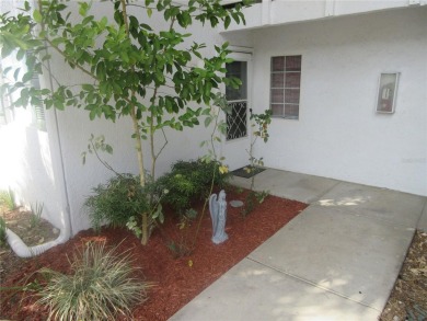 AFFORDBLE GROUND FLOOR 2/2 CONDOMINIUM JUST 500 FEET AWAY FROM on Country Club At Silver Springs Shores in Florida - for sale on GolfHomes.com, golf home, golf lot