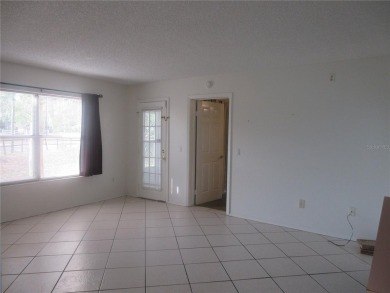 AFFORDBLE GROUND FLOOR 2/2 CONDOMINIUM JUST 500 FEET AWAY FROM on Country Club At Silver Springs Shores in Florida - for sale on GolfHomes.com, golf home, golf lot
