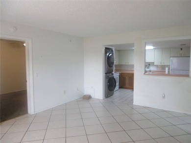 AFFORDBLE GROUND FLOOR 2/2 CONDOMINIUM JUST 500 FEET AWAY FROM on Country Club At Silver Springs Shores in Florida - for sale on GolfHomes.com, golf home, golf lot