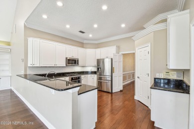 This beautifully maintained home offers breathtaking golf course on Jacksonville Golf and Country Club in Florida - for sale on GolfHomes.com, golf home, golf lot