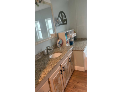 This beautiful 3 bedroom 2 bath home is located in one of the on Sabal Springs Golf and Racquet Club in Florida - for sale on GolfHomes.com, golf home, golf lot