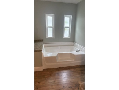 This beautiful 3 bedroom 2 bath home is located in one of the on Sabal Springs Golf and Racquet Club in Florida - for sale on GolfHomes.com, golf home, golf lot