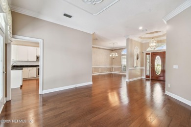 This beautifully maintained home offers breathtaking golf course on Jacksonville Golf and Country Club in Florida - for sale on GolfHomes.com, golf home, golf lot