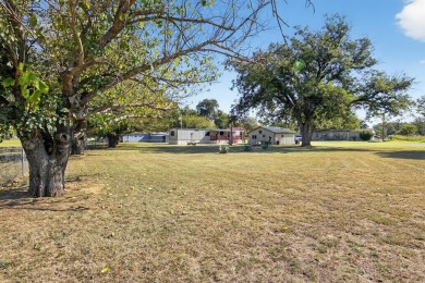 Video walk through available on YouTube! Singlewide on 3 lots on Horseshoe Bend Country Club in Texas - for sale on GolfHomes.com, golf home, golf lot