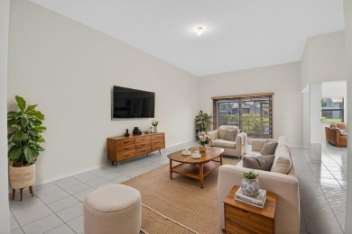 Nestled within a gated community, this 3 bedroom 2.5 bath on Boca Delray Golf and Country Club in Florida - for sale on GolfHomes.com, golf home, golf lot