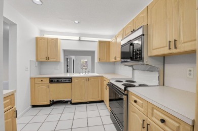 Nestled within a gated community, this 3 bedroom 2.5 bath on Boca Delray Golf and Country Club in Florida - for sale on GolfHomes.com, golf home, golf lot