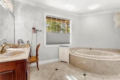 Stunning Waterfront Retreat in Gulf Hills - Ocean Springs on Gulf Hills Golf Club in MS - for sale on GolfHomes.com, golf home, golf lot