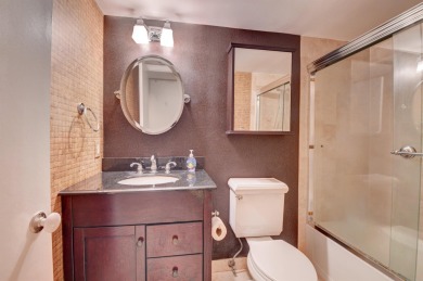 Beautifully updated 1-bedroom, 1-bath condo with direct golf on Seagate Country Club in Florida - for sale on GolfHomes.com, golf home, golf lot