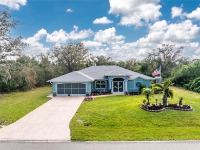 This custom-built, 4-bedroom, solar, waterfront home with a pool on Port Charlotte Golf Club in Florida - for sale on GolfHomes.com, golf home, golf lot