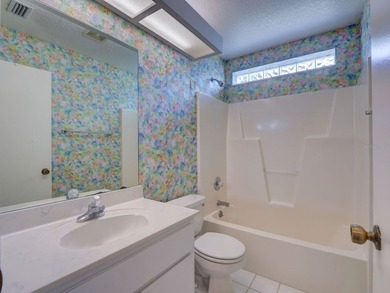 One or more photo(s) has been virtually staged. Live the Florida on Royal Oaks Golf Club in Florida - for sale on GolfHomes.com, golf home, golf lot