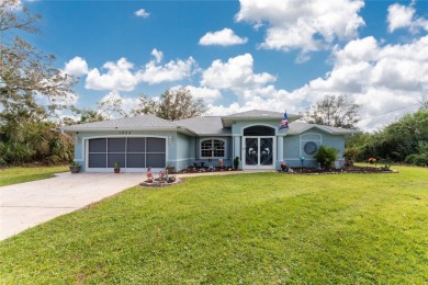 This custom-built, 4-bedroom, solar, waterfront home with a pool on Port Charlotte Golf Club in Florida - for sale on GolfHomes.com, golf home, golf lot