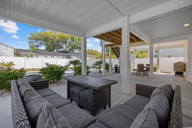 Step inside your dream beach getaway in charming North Myrtle on Beachwood Golf Club in South Carolina - for sale on GolfHomes.com, golf home, golf lot
