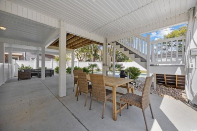 Step inside your dream beach getaway in charming North Myrtle on Beachwood Golf Club in South Carolina - for sale on GolfHomes.com, golf home, golf lot