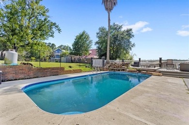 Stunning Waterfront Retreat in Gulf Hills - Ocean Springs on Gulf Hills Golf Club in MS - for sale on GolfHomes.com, golf home, golf lot