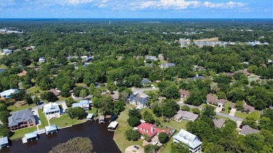 Stunning Waterfront Retreat in Gulf Hills - Ocean Springs on Gulf Hills Golf Club in MS - for sale on GolfHomes.com, golf home, golf lot
