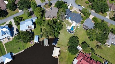 Stunning Waterfront Retreat in Gulf Hills - Ocean Springs on Gulf Hills Golf Club in MS - for sale on GolfHomes.com, golf home, golf lot