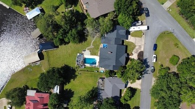 Stunning Waterfront Retreat in Gulf Hills - Ocean Springs on Gulf Hills Golf Club in MS - for sale on GolfHomes.com, golf home, golf lot